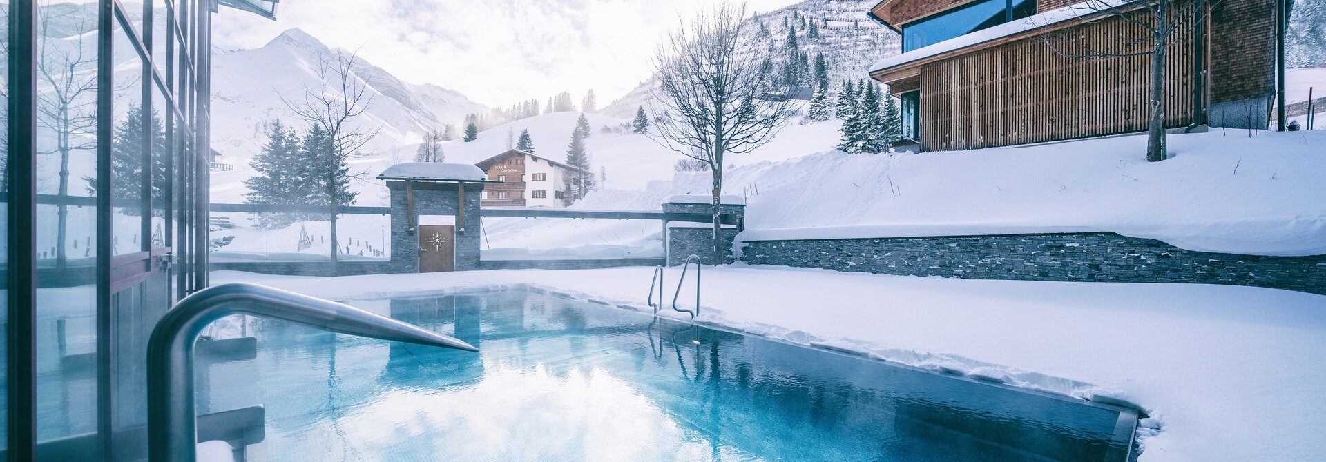 Außenpool im Winter | Wellnessurlaub am Arlberg, Hotel Warther Hof