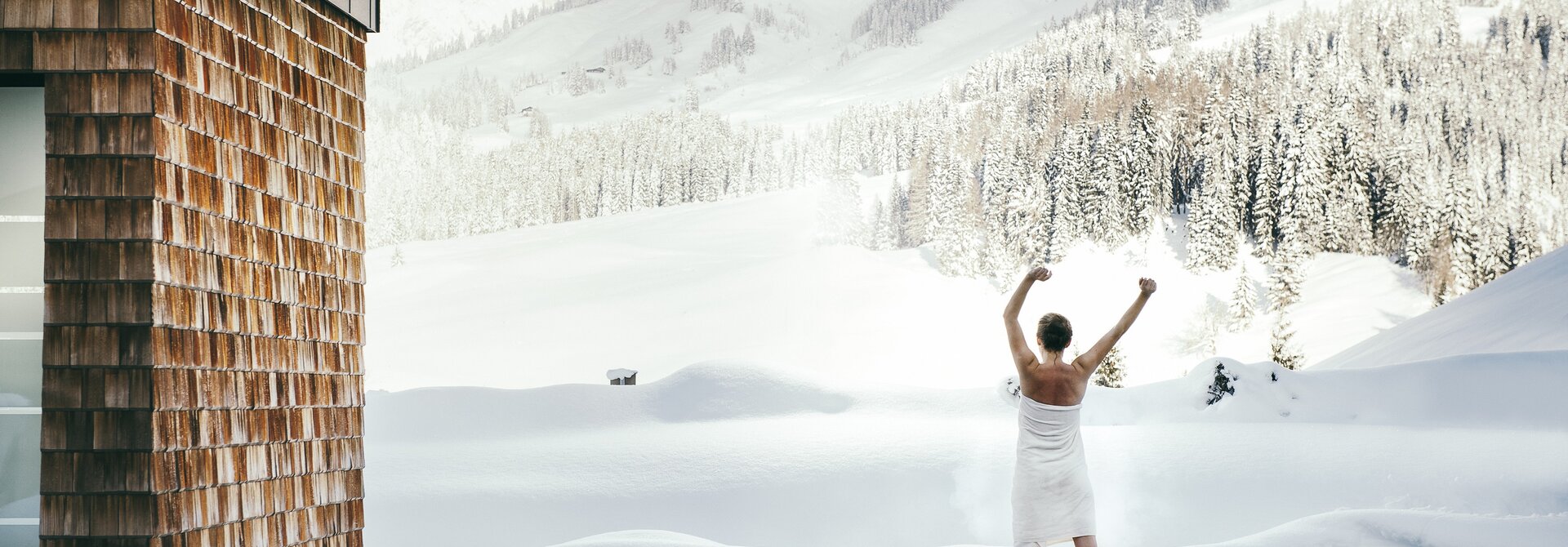 Cooling down in the Snow after the Sauna Session | Übergossene Alm Resort, Wellnesshotel Hochkönig